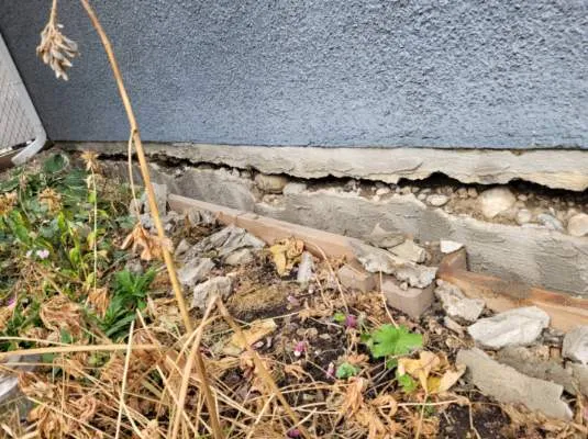 compromised parging ready to be repaired in Calgary
