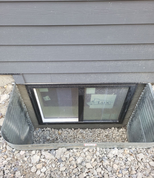 finished parging around new window installation